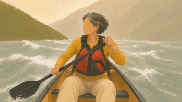 Vrouw op woeste rivier kanoënd